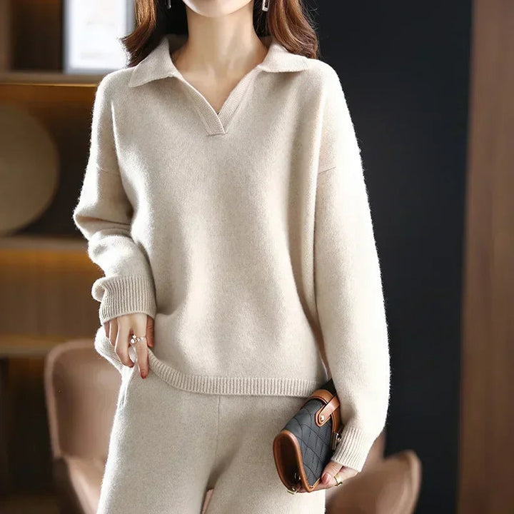Soft, premium cashmere women's two-piece set, highlighting luxurious knit texture & quality.