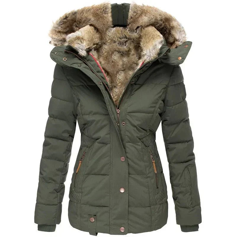 Elegant women's puffer coat, quilted for warmth, featuring a beautiful faux fur hood.
