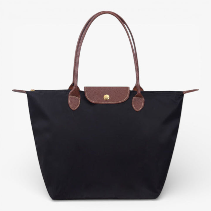 Women's luxury spacious shoulder handbag with secure zip closure, stylish and elegant design.