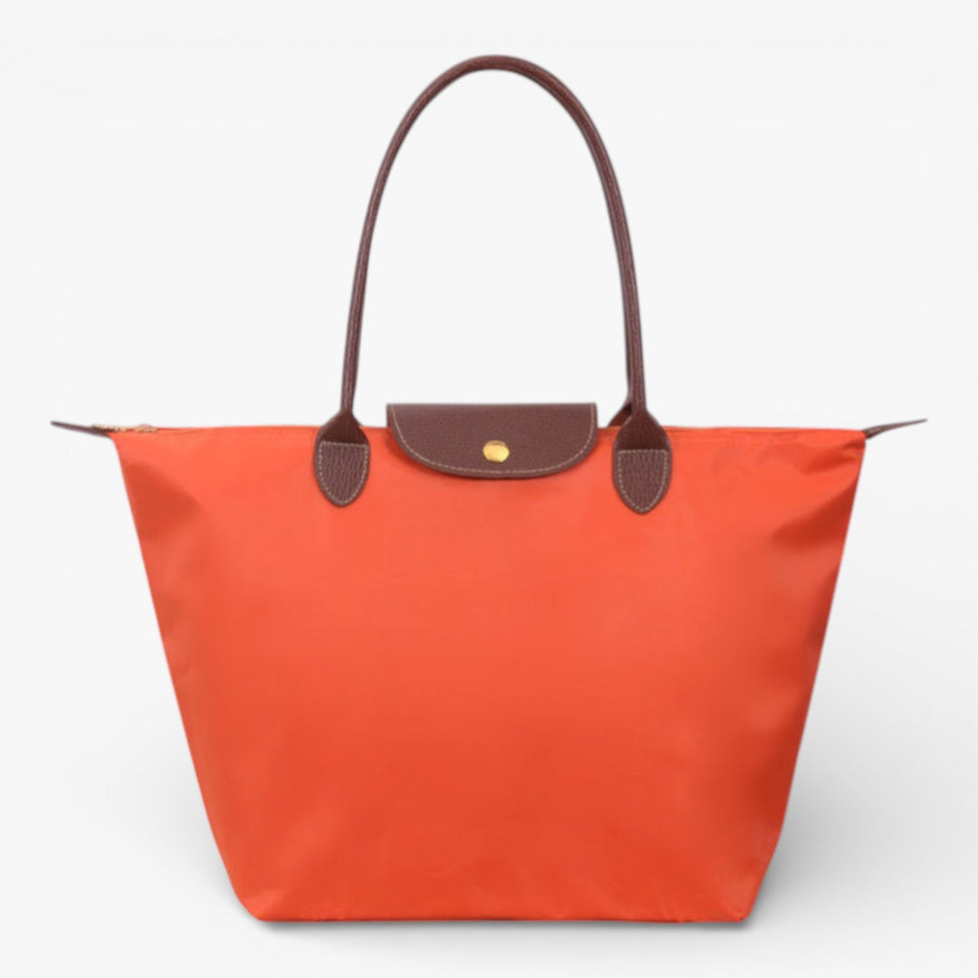 Organized women's spacious shoulder bag, luxury finish, secure zip closure for all your daily necessities.