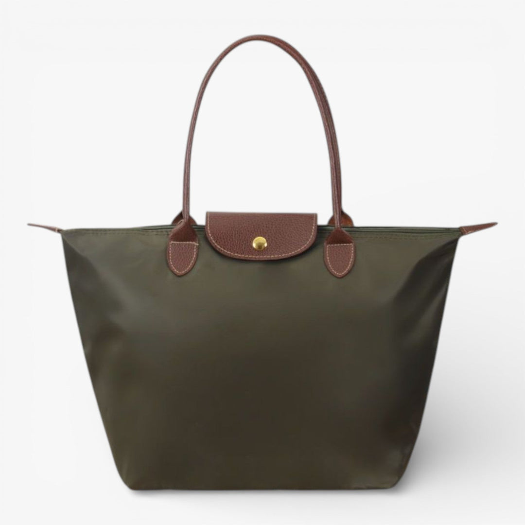 Elegant women's luxury shoulder bag with premium material, spacious interior, and secure zip for daily use.