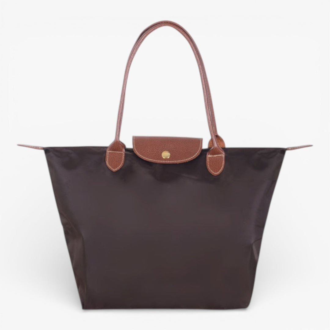 Stylish women's luxury shoulder handbag, versatile for work, casual outings, or elegant events, secure zip.