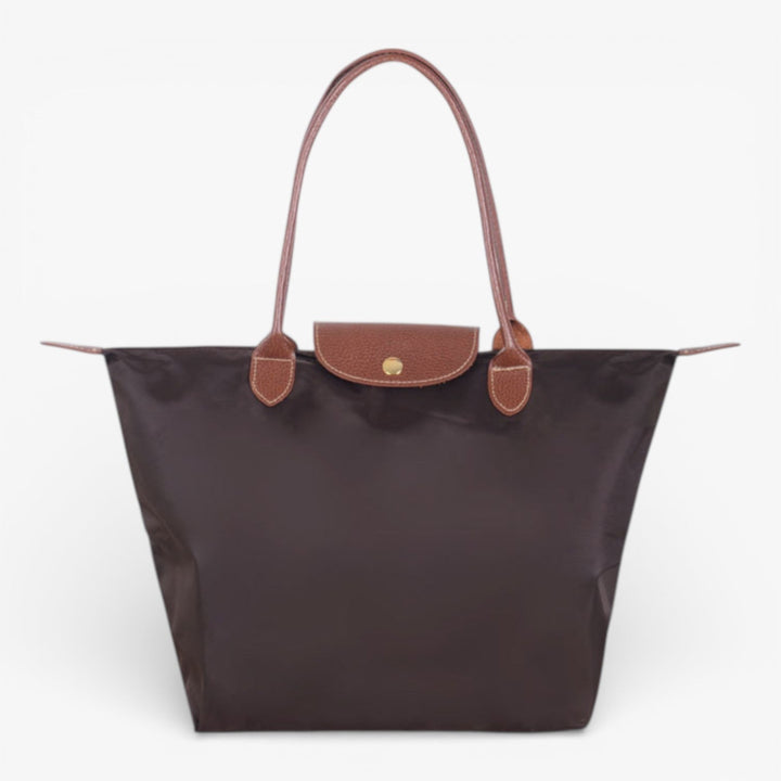 Stylish women's luxury shoulder handbag, versatile for work, casual outings, or elegant events, secure zip.