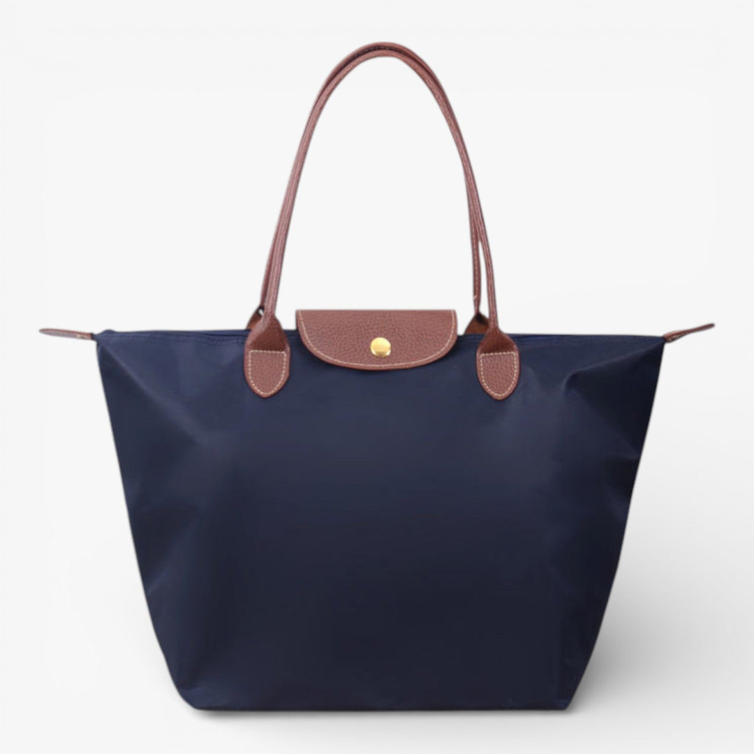 Secure zip women's luxury shoulder bag, spacious and stylish, ideal for protecting daily essentials and fashion.