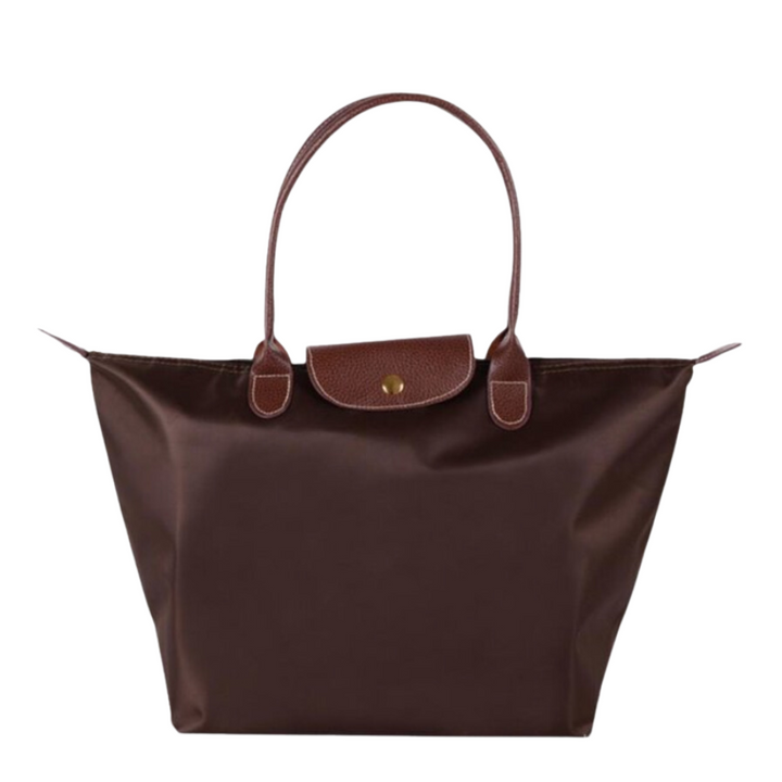 Chic women's shoulder bag, luxury design, spacious capacity, and secure zip closure for comfortable everyday carry.