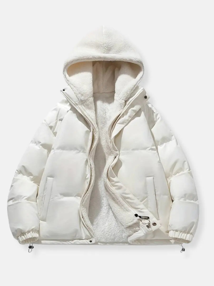 Functional & fashionable women's hooded puffer, ideal for comfort in winter.