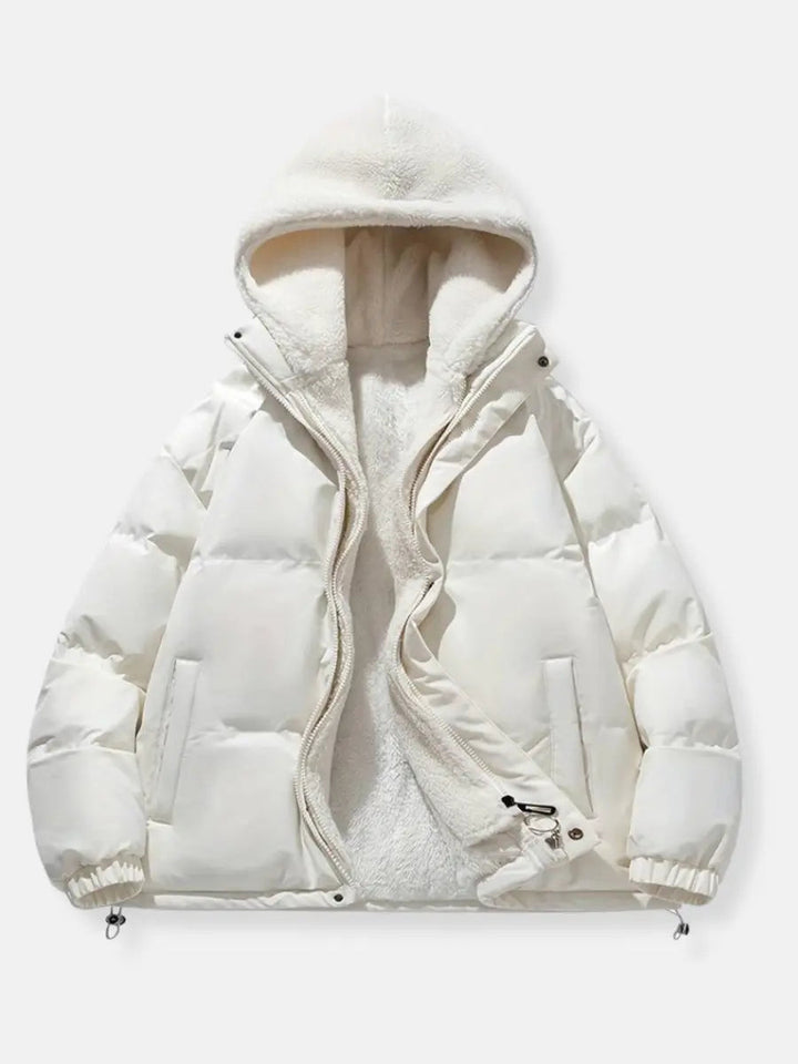 Functional & fashionable women's hooded puffer, ideal for comfort in winter.