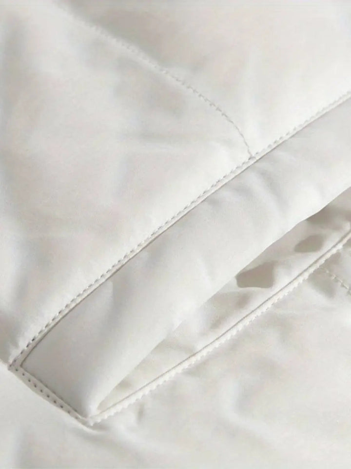 Trendy women's winter jacket, luxury appeal with ultimate warmth and a practical hood.