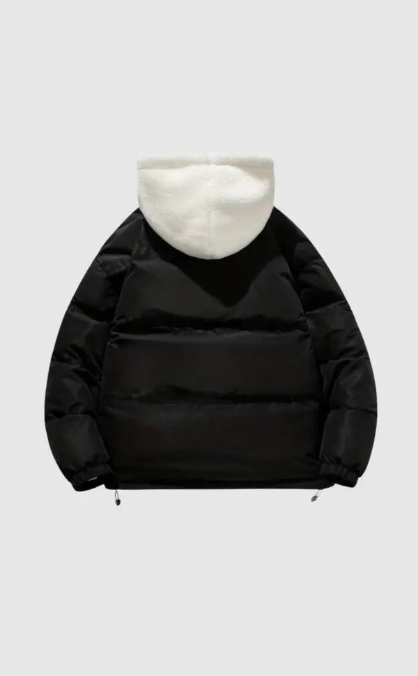 Chic women's hooded puffer coat, cozy & comfortable for winter travel.