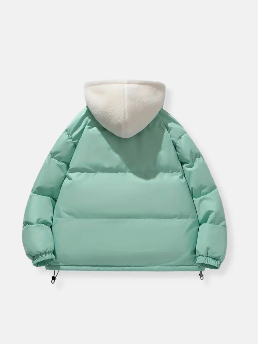 Padded women's jacket, warm outerwear, stylish for winter, casual or outdoor adventure.