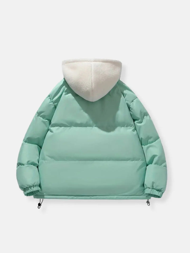 Padded women's jacket, warm outerwear, stylish for winter, casual or outdoor adventure.