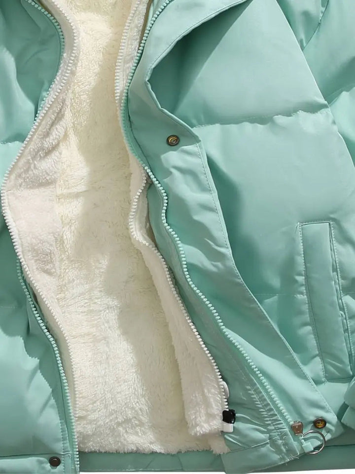 Stylish women's winter jacket, luxury design, warm and comfortable for cold weather.