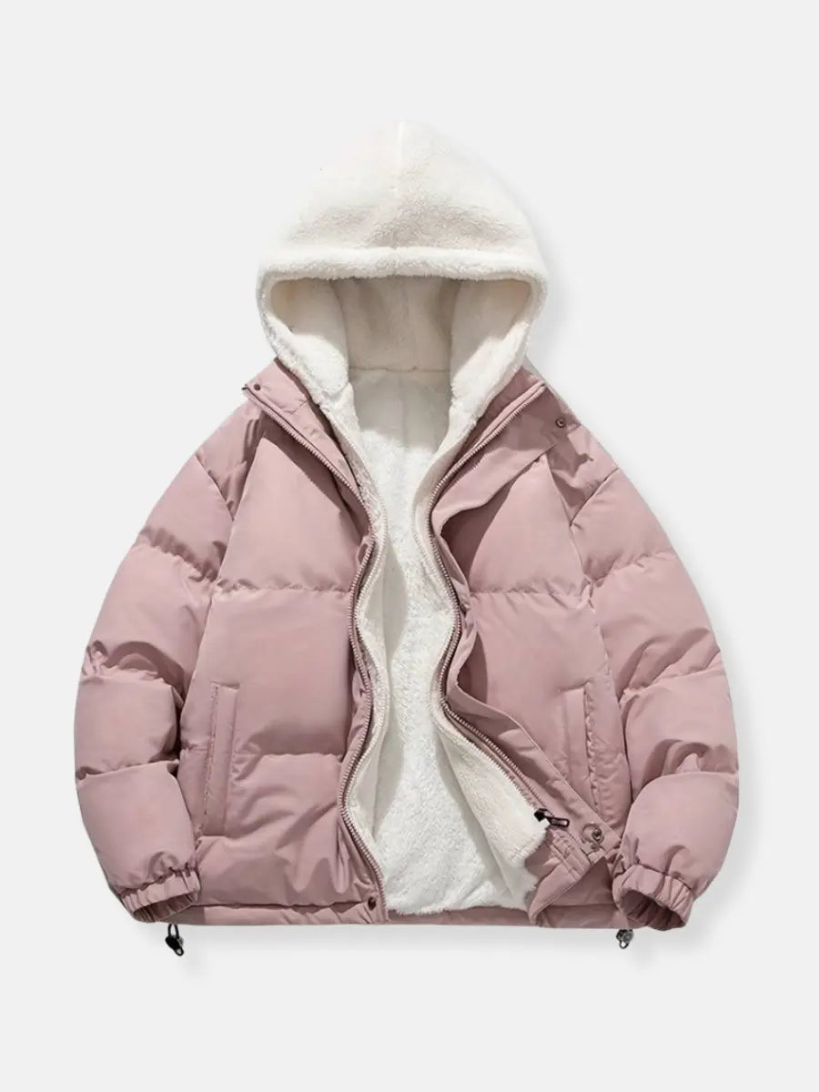 Comfortable women's luxury puffer jacket, essential warm outerwear for winter.