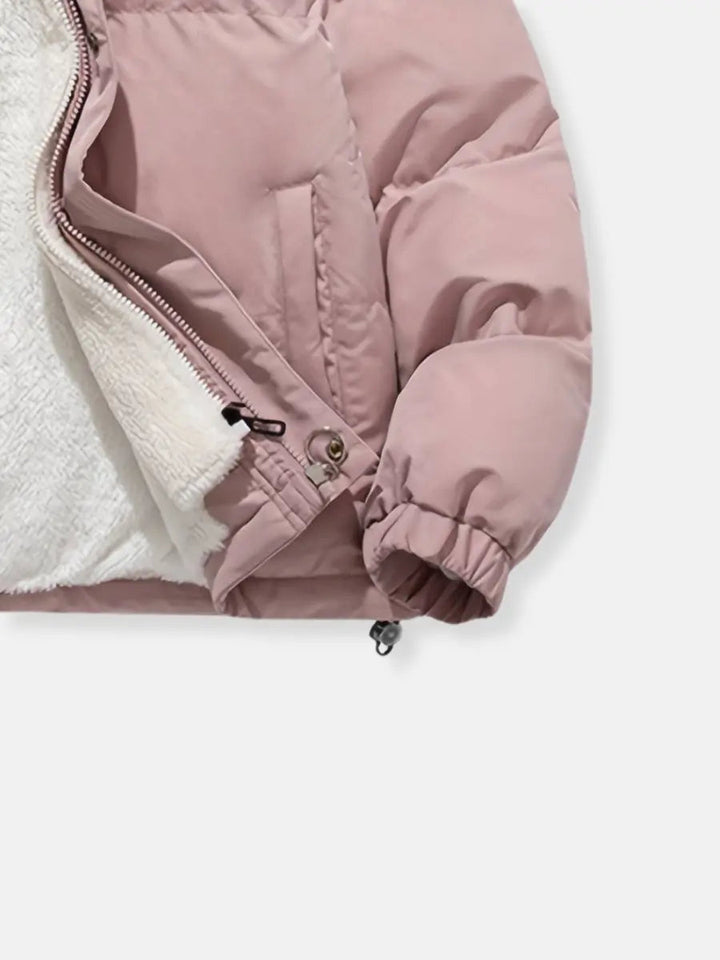 Luxury women's warm winter jacket, perfect for stylish protection in cold climates.