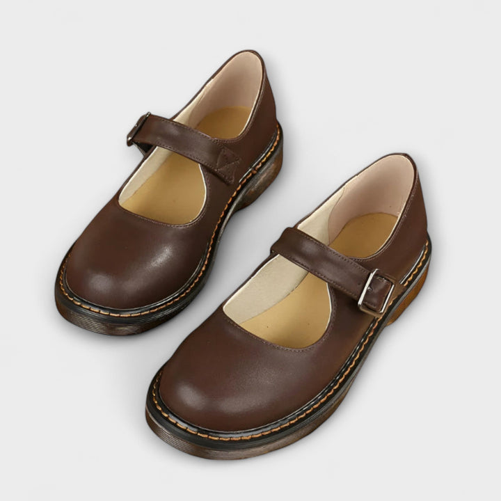 Women's Mary Jane flats with a sleek buckle strap, perfect for work, casual everyday wear, or dress events.