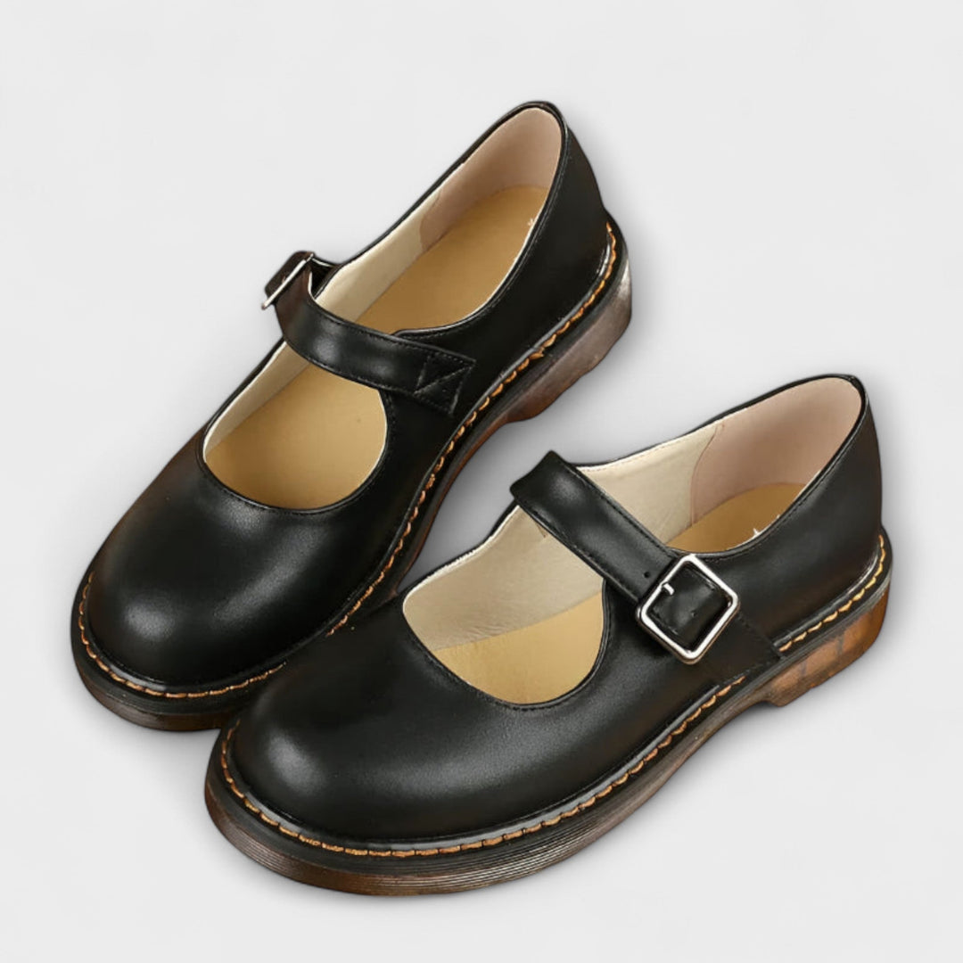 Classic women's Mary Jane flats, comfortable and stylish with a vintage-inspired buckle, ideal for versatile wear.