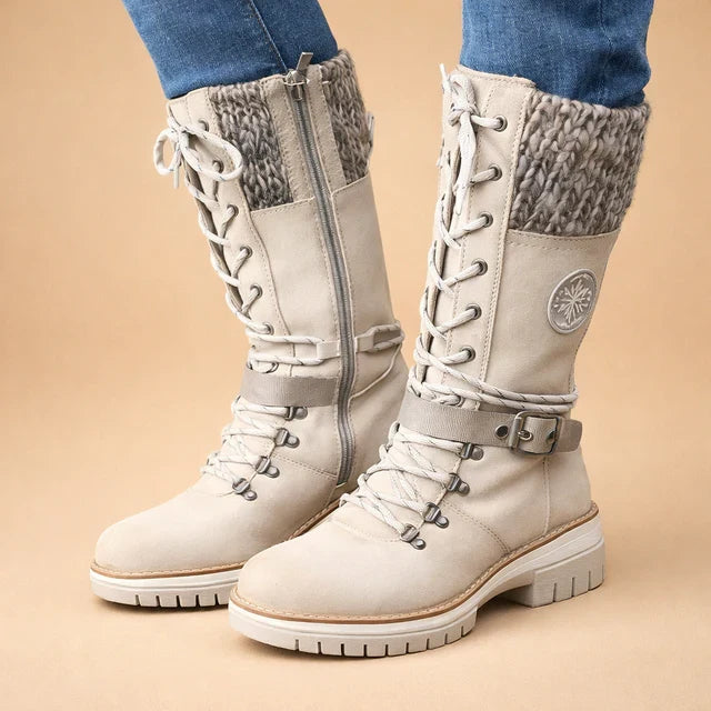 Women's mid-calf lace-up ankle boots with comfort collar, ideal for everyday wear in cold weather.