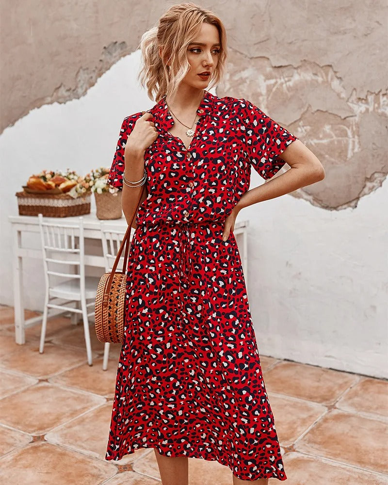 Fashionable women's printed summer dress, midi length, with practical adjustable waist.