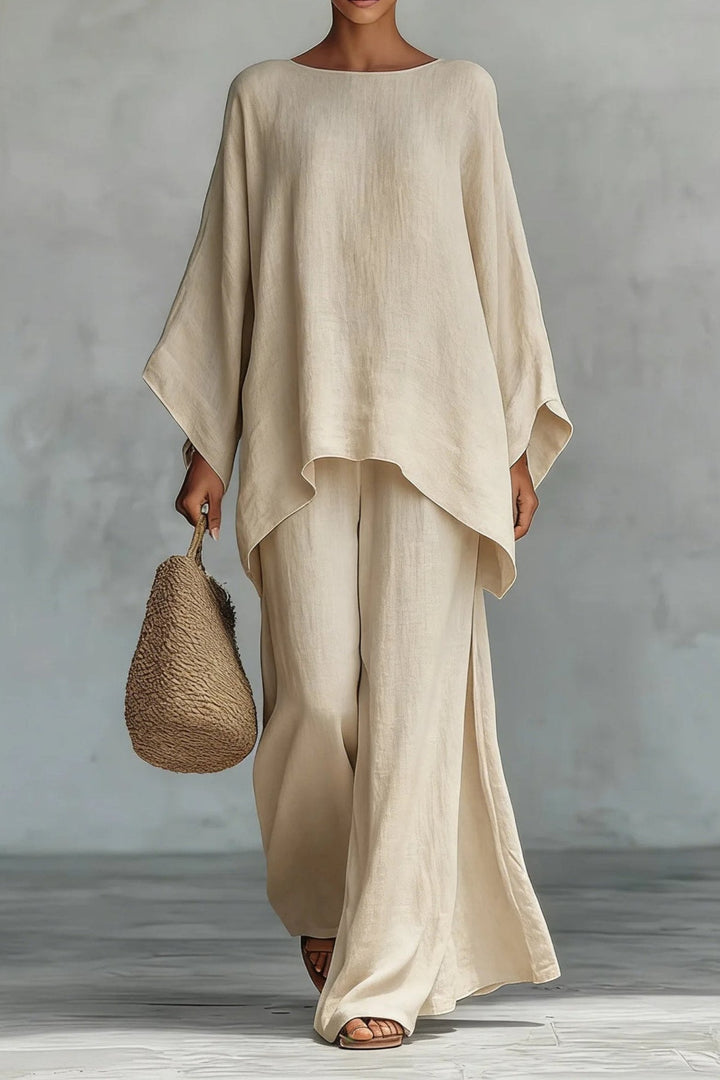 Comfortable women's batwing-sleeve two-piece set with wide-leg pants, ideal for chic casual or summer relaxation.