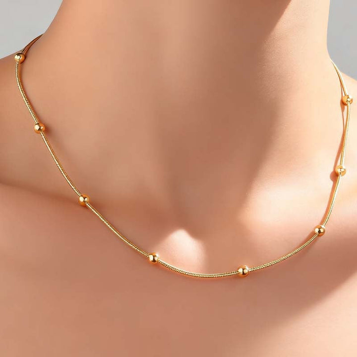 Silver tone minimalist charm anklet for women. Stylish summer jewelry & fashion accessory.