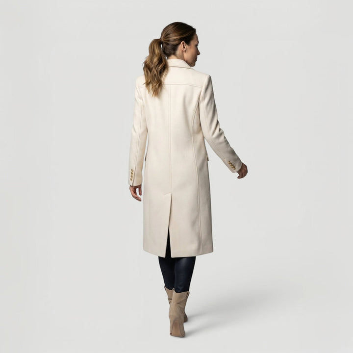 Classic women's minimalist double-breasted jacket, ideal for elegant everyday and office wear.