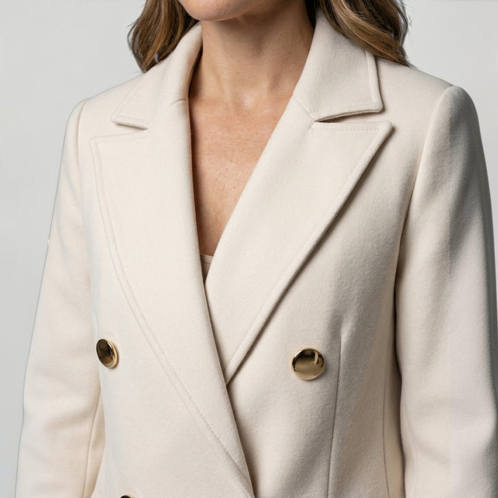 Fashionable women's double-breasted outerwear, minimalist design, great for fall & winter style.