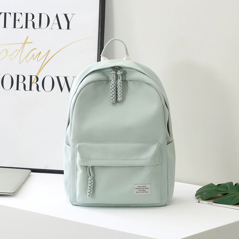 Stylish women's minimalist backpack, an essential everyday bag for urban commuters, students, and casual travel.
