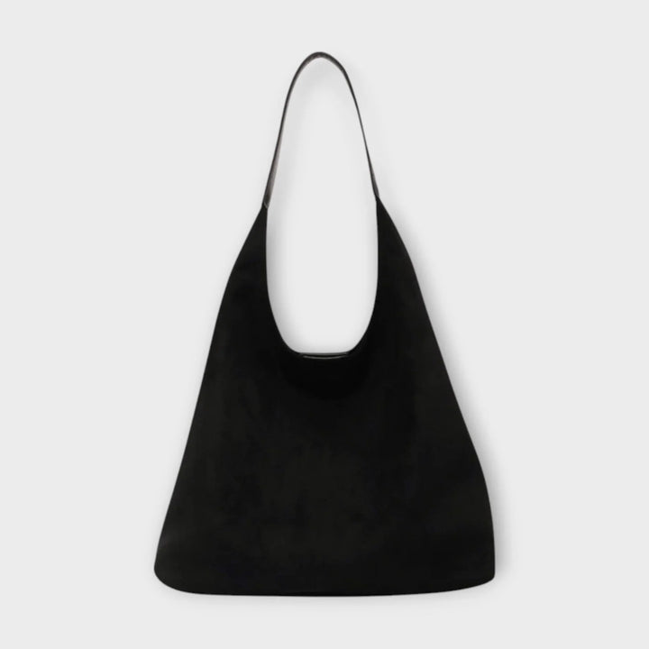 Stylish women's minimalist hobo bag for a versatile & effortless look. Casual shoulder handbag.