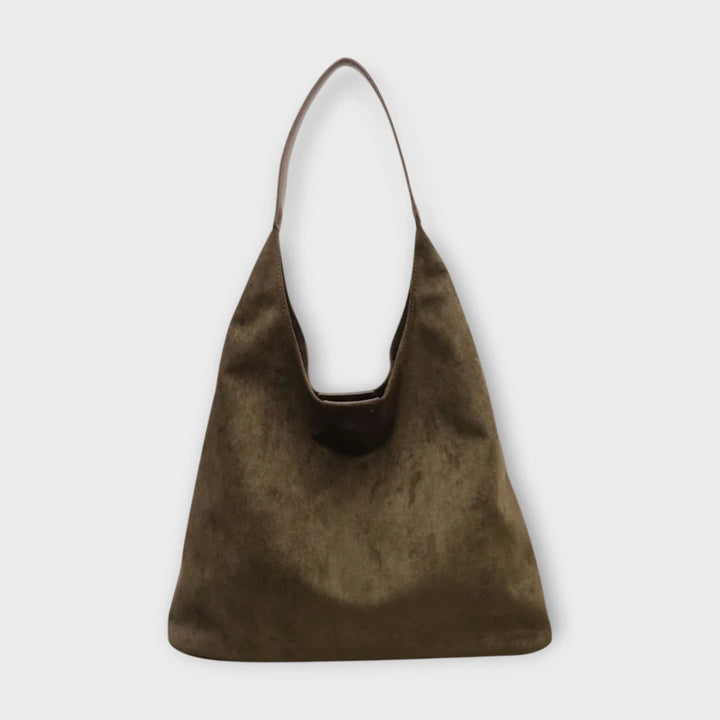 Timeless women's shoulder hobo bag; minimalist design for everyday versatility. Effortless handbag style.