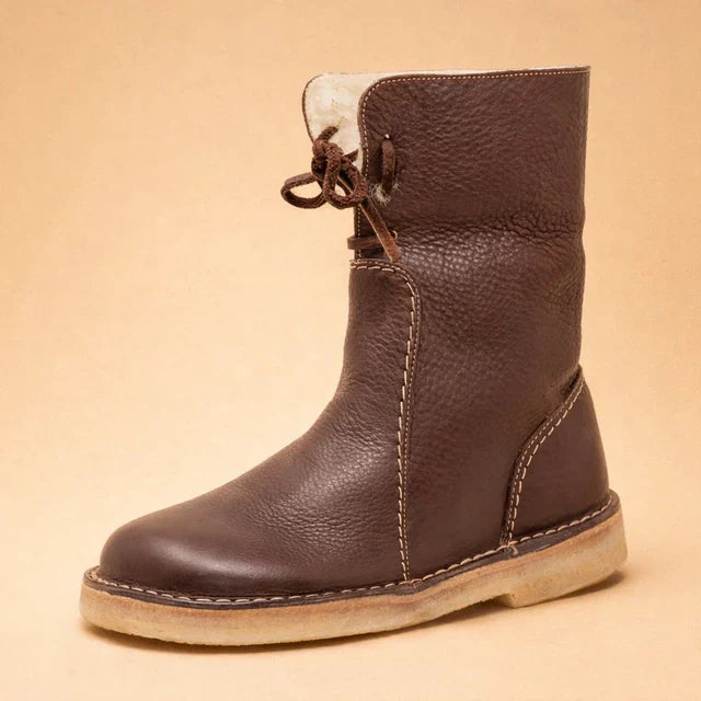 Fashionable women's minimalist lace-up ankle boots. Warm, durable, & comfortable for winter and daily wear.