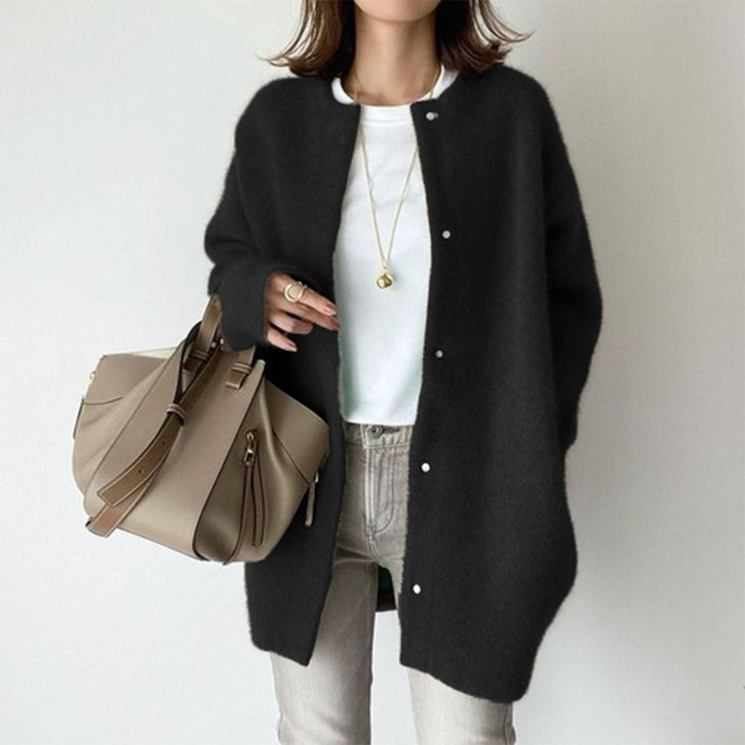 Versatile women's longline button-up cardigan for autumn layering. Chic and sophisticated.