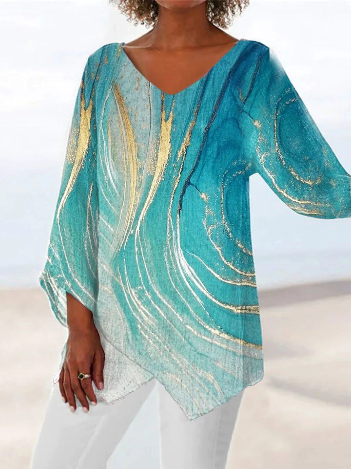 Women's minimalist marble print asymmetric hem top with short batwing sleeves & V-neck, stylish summer fashion.