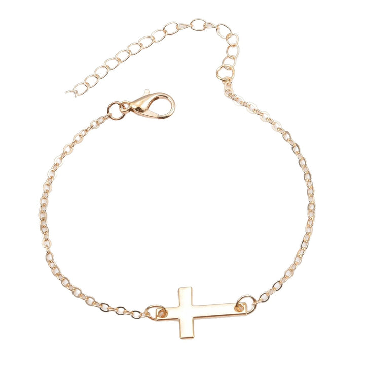 Delicate silver charm bracelet with a minimalist cross, spiritual jewelry for women, elegant & adjustable.