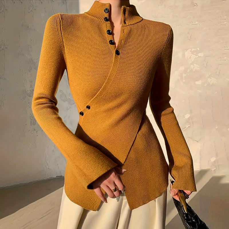 Women's mock neck wrap sweater with asymmetrical hem & button detail. Chic fall/winter fashion.