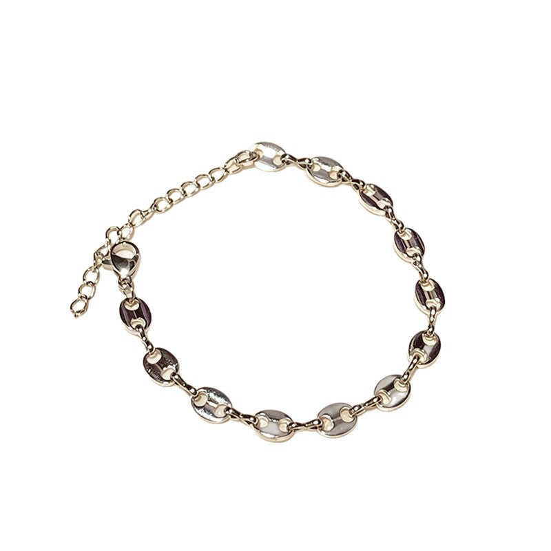 Bold women's statement necklace, a chunky linked chain design in a sleek, modern finish.