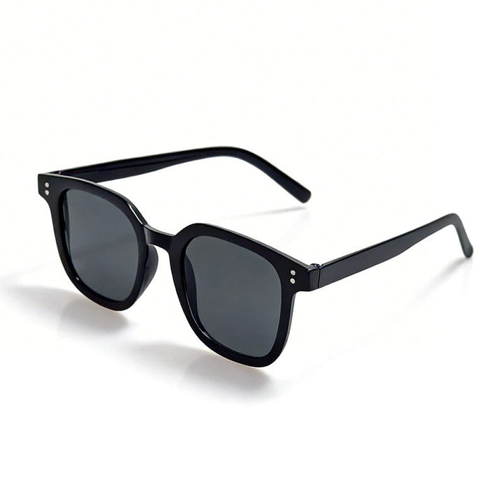 Modern oversized square sunglasses for women, a stylish black fashion accessory for a chic look.
