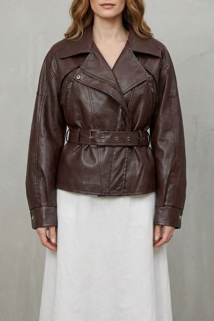 Front view of a women's modern sculpted belted jacket, a stylish statement piece for any outfit.