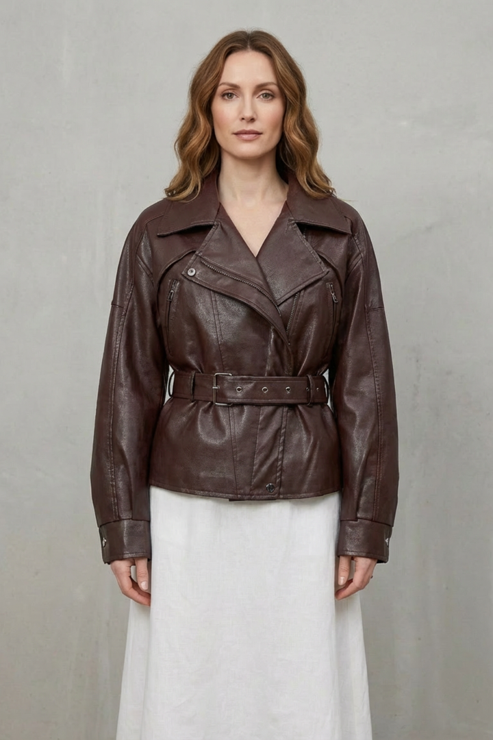 Side view of the women's modern sculpted belted jacket, showcasing its unique and flattering silhouette.