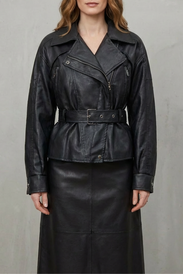 Close-up of the elegant belt on a women's modern sculpted jacket, highlighting quality and style.