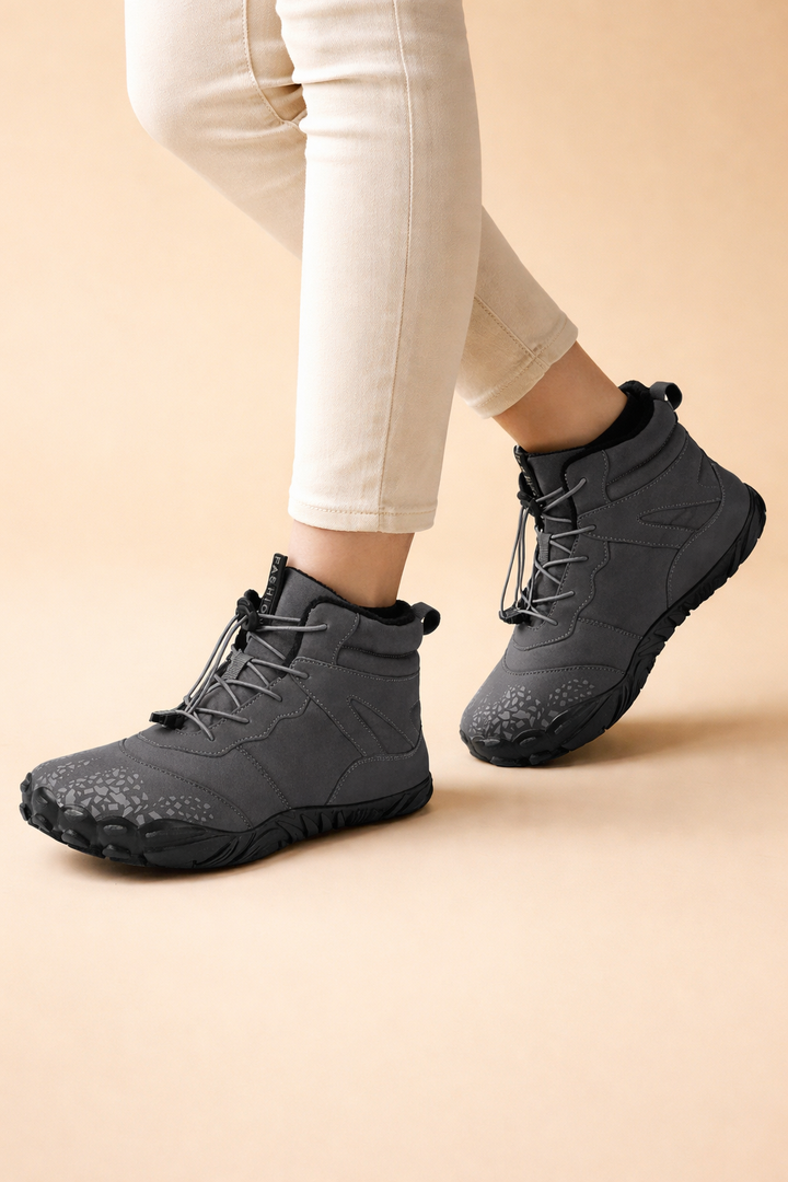 Women's modern waterproof winter boots with barefoot design for natural movement & comfort.
