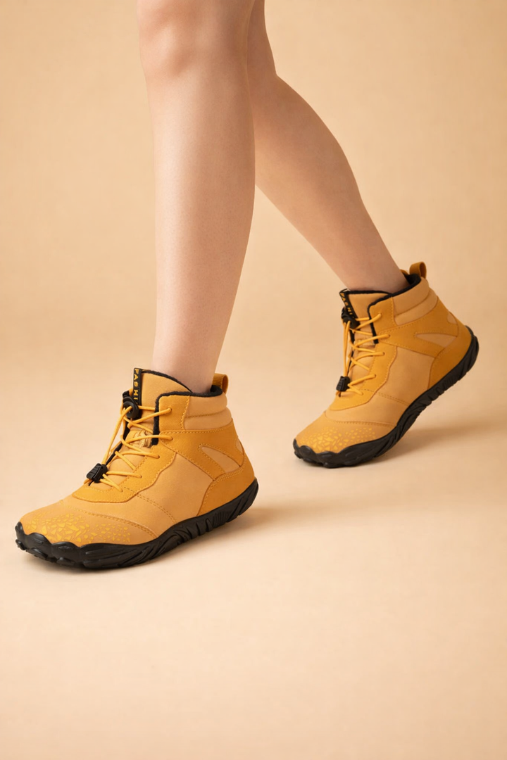 Ladies' waterproof winter boots, modern barefoot footwear, offering style, comfort & protection from elements.