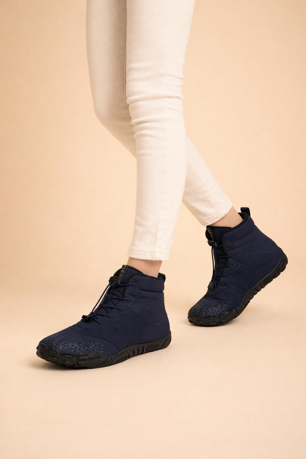Women's modern waterproof barefoot boots, perfect for winter, providing warmth, natural feel & protection.