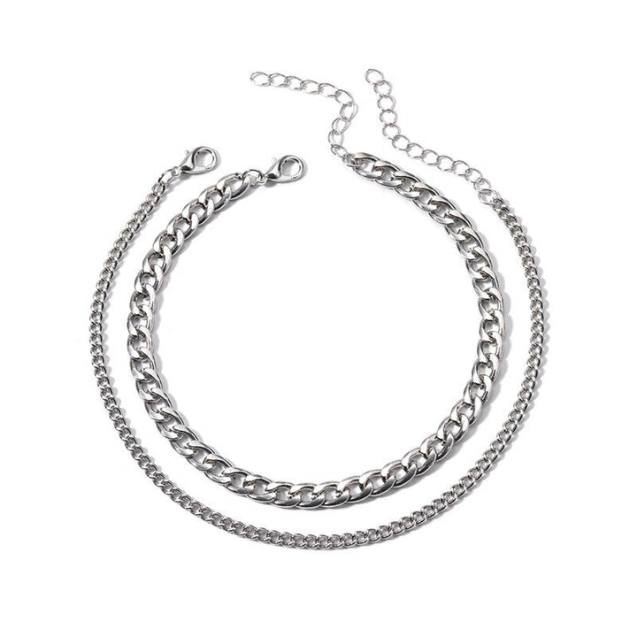 Chic women's silver & gold layered chain necklace. Fashion jewelry for an elegant, modern look.