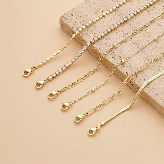 Stylish women's layered bracelet set with silver & gold charms, a perfect gift for her.