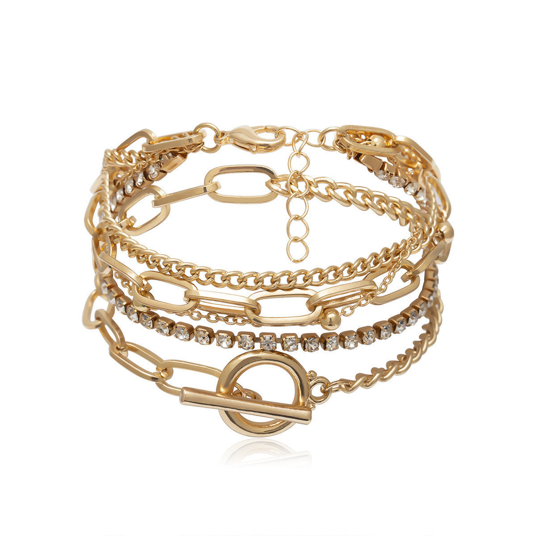 Delicate multi-layered chain bracelet in gold-tone, a versatile and elegant women's fashion jewelry piece.