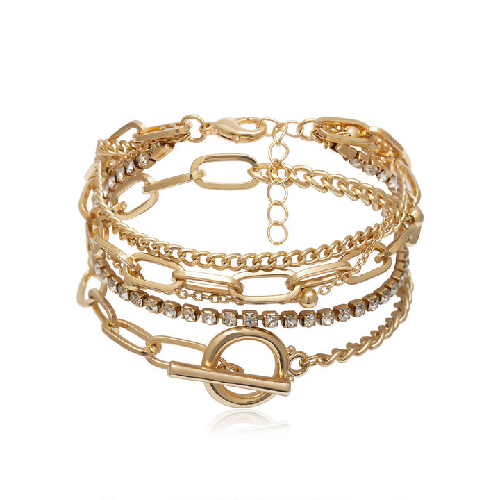 Delicate multi-layered chain bracelet in gold-tone, a versatile and elegant women's fashion jewelry piece.