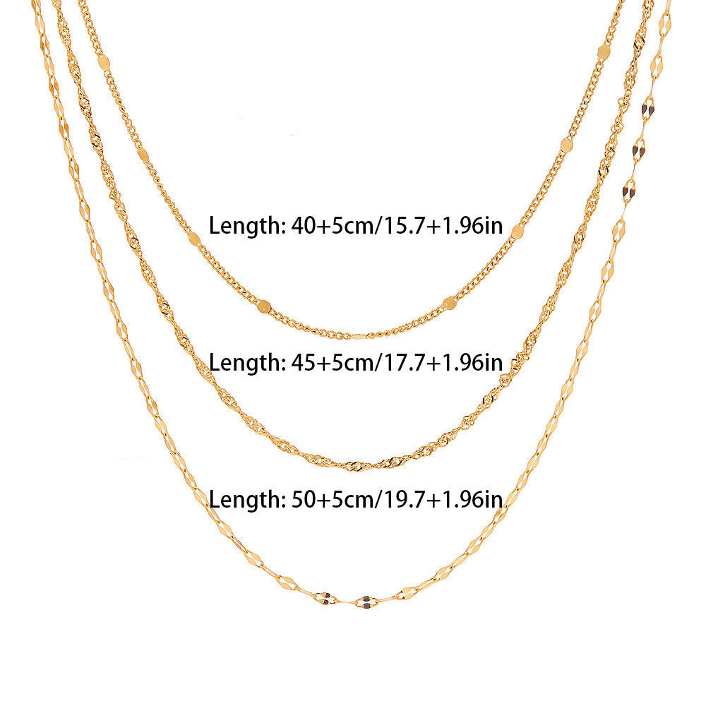 Chic women's gold layered necklace, perfect for daily wear or evening elegance, featuring delicate chains and pearls.