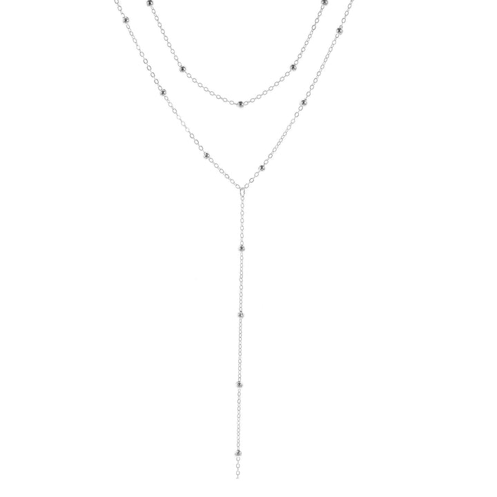 Stunning multi-layered gold lariat necklace with charms, an elegant gift for women. Beautiful fashion jewelry.