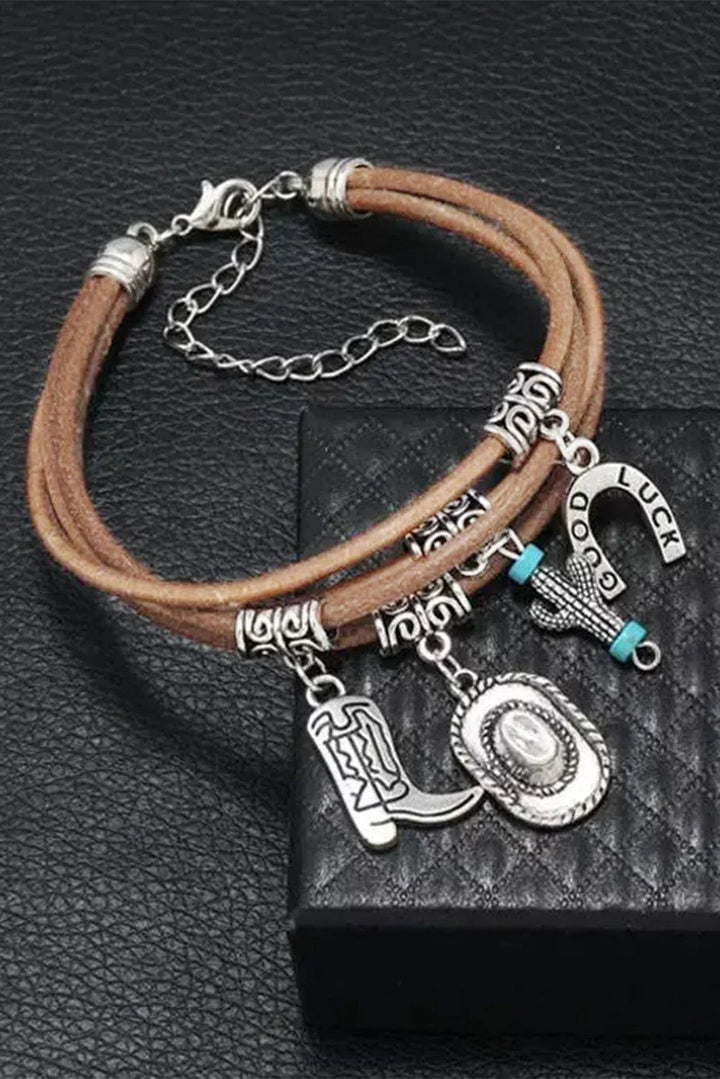 Unique western charm bracelet for women, multi-layered silver with detailed hat, boot, and cactus charms.