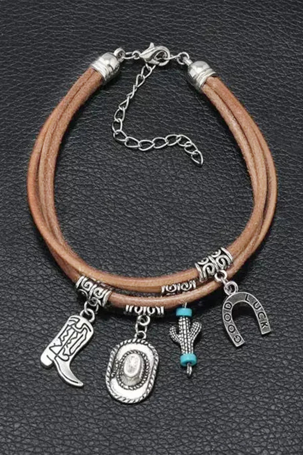 Multi-layered women's silver charm bracelet with western hat, boot, and cactus details. Unique bohemian jewelry.